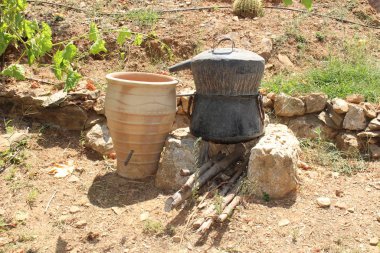 Old traditional and sooty cauldron ready to cook in a village in Chania in Crete Island, Greece. 