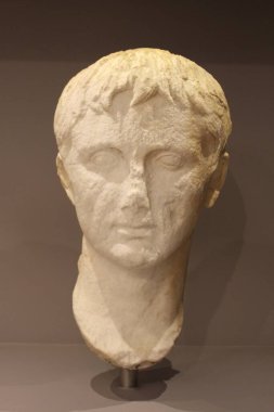 HERAKLION, CRETE, GREECE - AUGUST 1, 2016: Marble portrait of the first Roman emperor Gaius Julius Caesar Augustus, belongs to Roman Period 1th cent AD at the Heraklion Archaeological Museum.