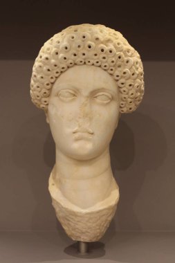 HERAKLION, CRETE, GREECE - AUGUST 1, 2016: Marble portrait, probably of Domitia Longina, wife of emperor Domitian, belongs to the Roman Period 1th cent AD at the Heraklion Archaeological Museum.