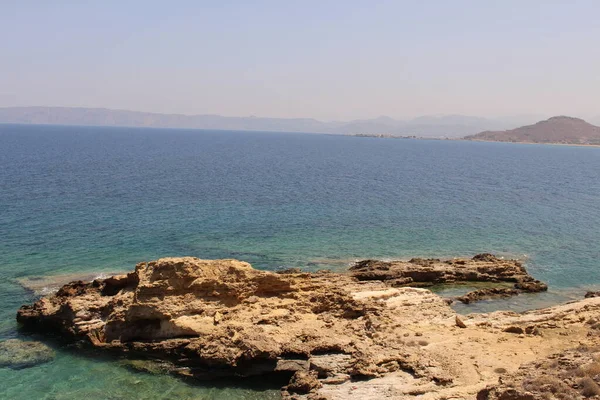 Blue Mediterranean Sea and Rodopos peninsula, taken from the Balos peninsula, near Kissamos in Chania prefecture, Crete Island, Greece.