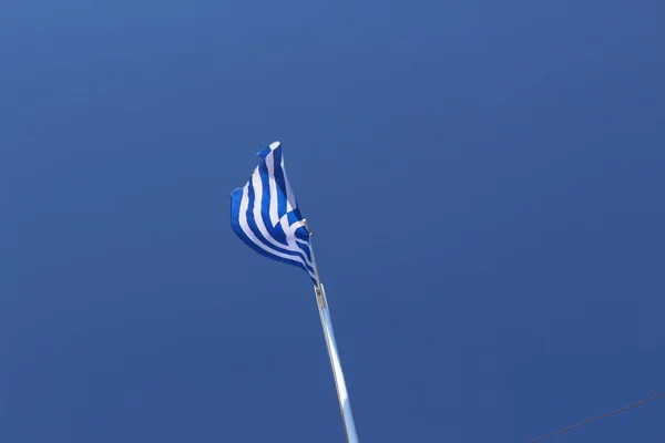 Swaying Greece National Flag Flagpole Background Blue Sky Firkas Fortress — Stock fotografie