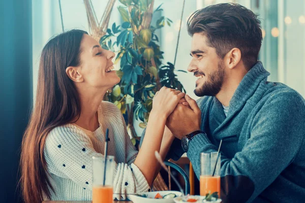 Happy young couple in cafe — Stock Photo, Image