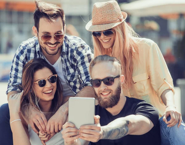 Happy friends making selfie outdoors — Stock Photo, Image