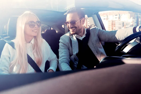 Shot of a young couple on a road trip — Stock Photo, Image