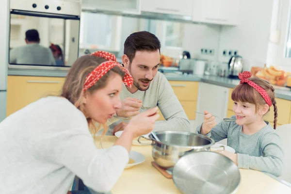Happy family in kitchen — Stock Photo, Image