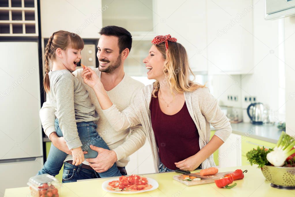family preparing vegetables 