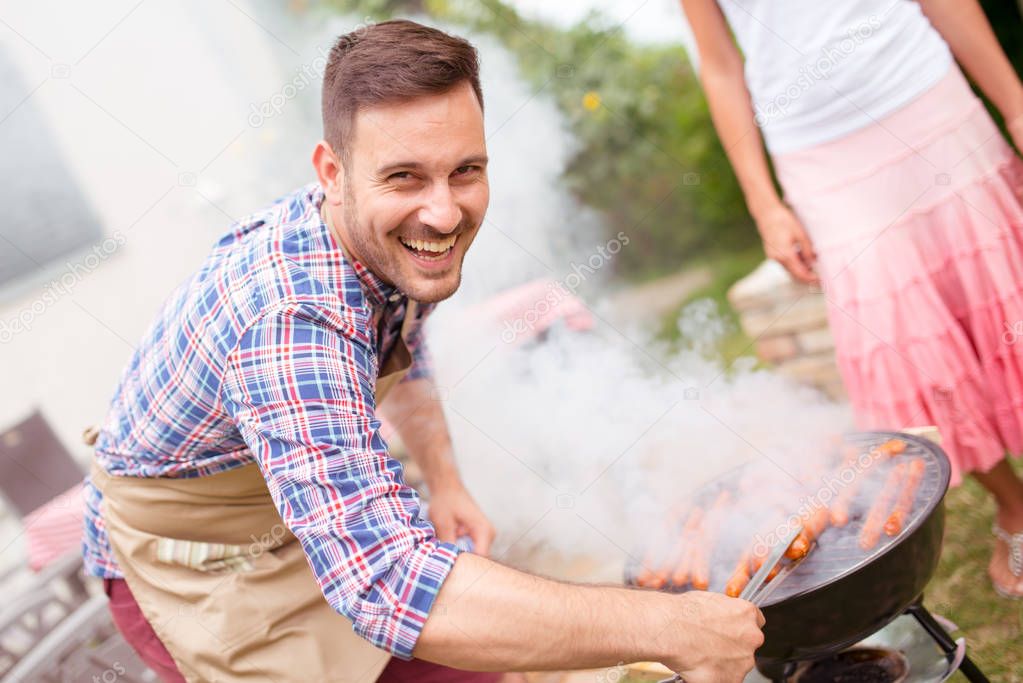 couple making barbecue