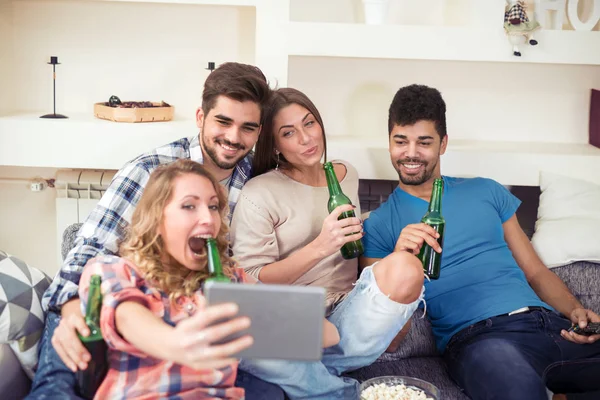 Friends having fun and taking selfie with tablet. — Stock Photo, Image