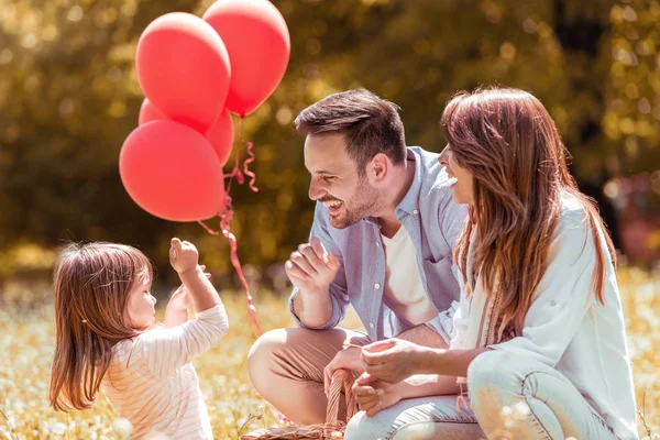 Little daughter and her parents — Stock Photo, Image