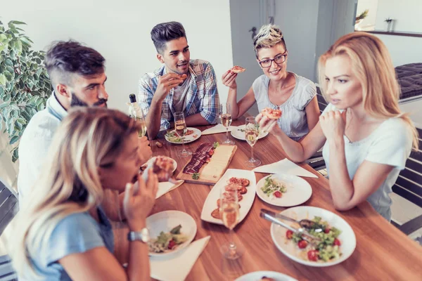 Friends having dinner