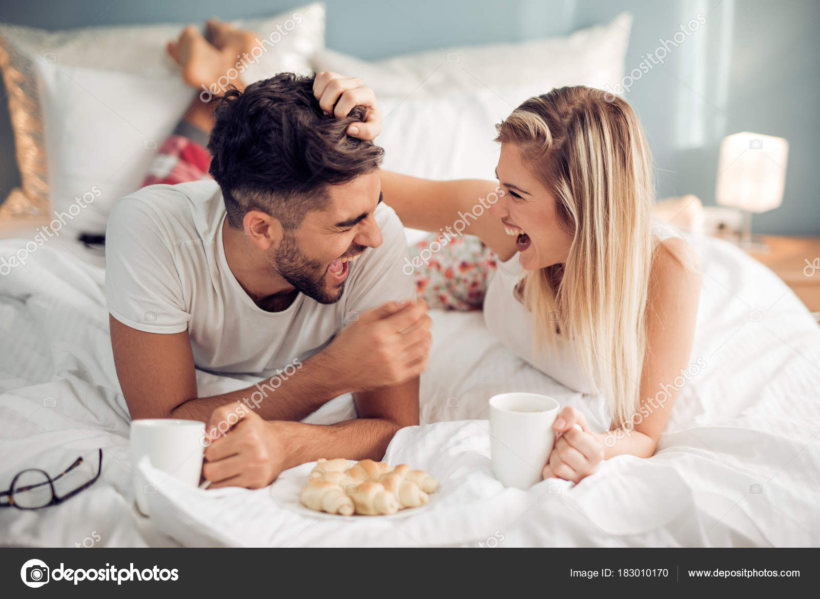Romantic Couple Having Breakfast Bedroom Stock Photo