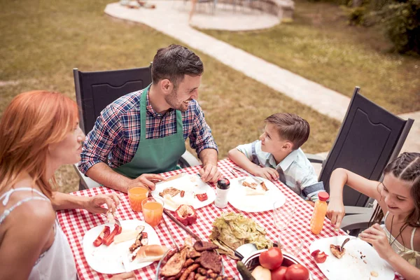 Happy Young Family Having Barbecue Lunch Garden Sunny Day — Stock Photo, Image