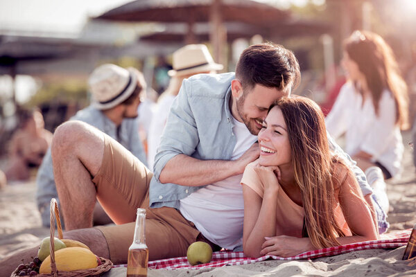 Romantic young couple on the beach