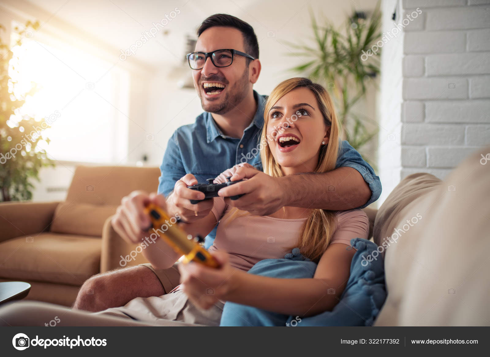 Couple Playing Video Game - Stock Photo - Masterfile - Premium