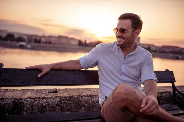 Man Sitting Alone Park Bench River — Stock Photo, Image