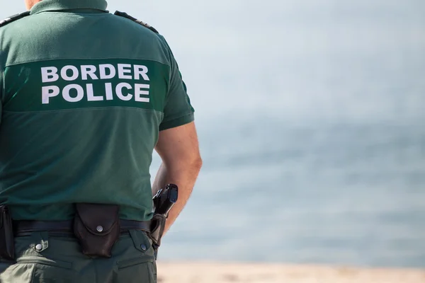 Encerramento de um agente da polícia de fronteira — Fotografia de Stock