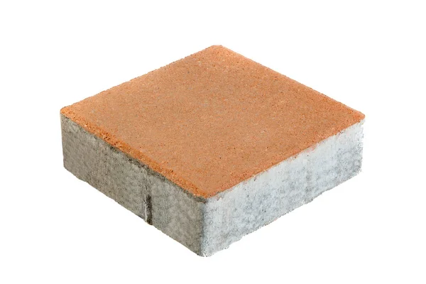 En tegelsten, isolerad. Betongblock för markbeläggning — Stockfoto