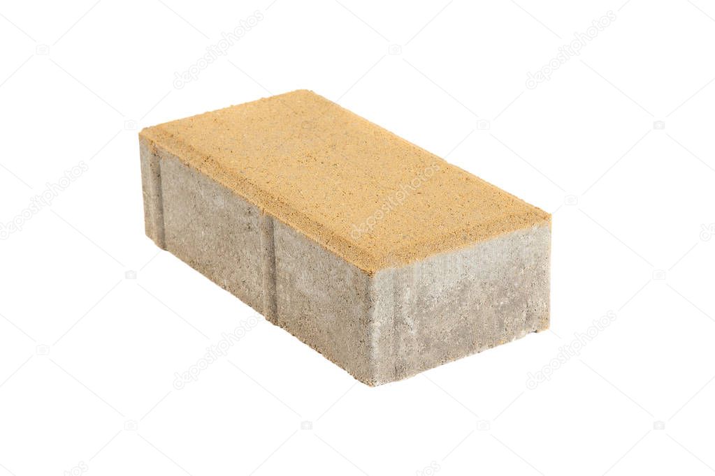 Single yellow pavement brick, isolated. Concrete block for paving