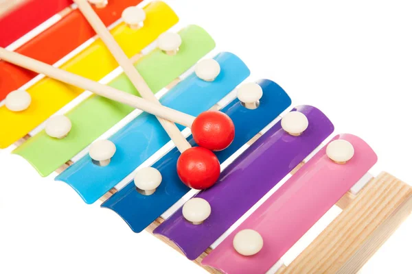 Juguete xilófono de color arco iris, aislado en blanco — Foto de Stock