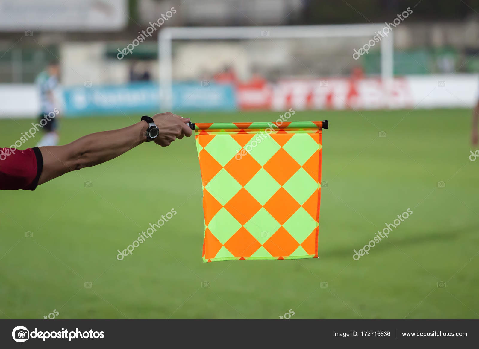Soccer referee hold the flag. Offside trap Stock Photo by ©dechevm