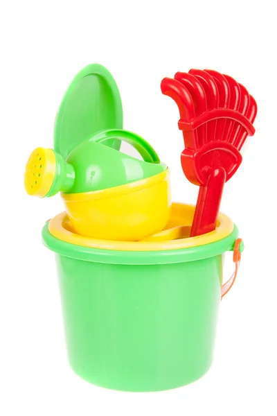 Beach bucket with toys isolated on white — Stock Photo, Image