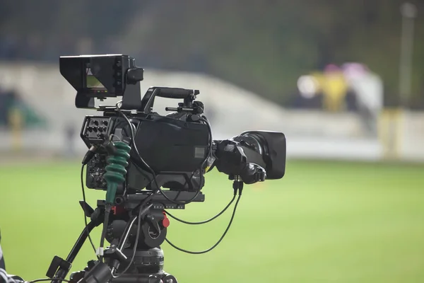 TV camera at the stadium, broadcasting during a football (soccer) match — Stock Photo, Image