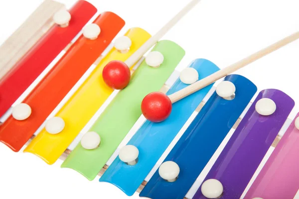 Regenboog gekleurde speelgoed xylofoon, geïsoleerd op wit — Stockfoto