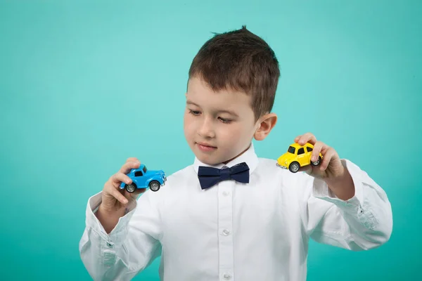Cute Little Boy White Shirt Bow Tie Playing Cars Toy — Stock Photo, Image
