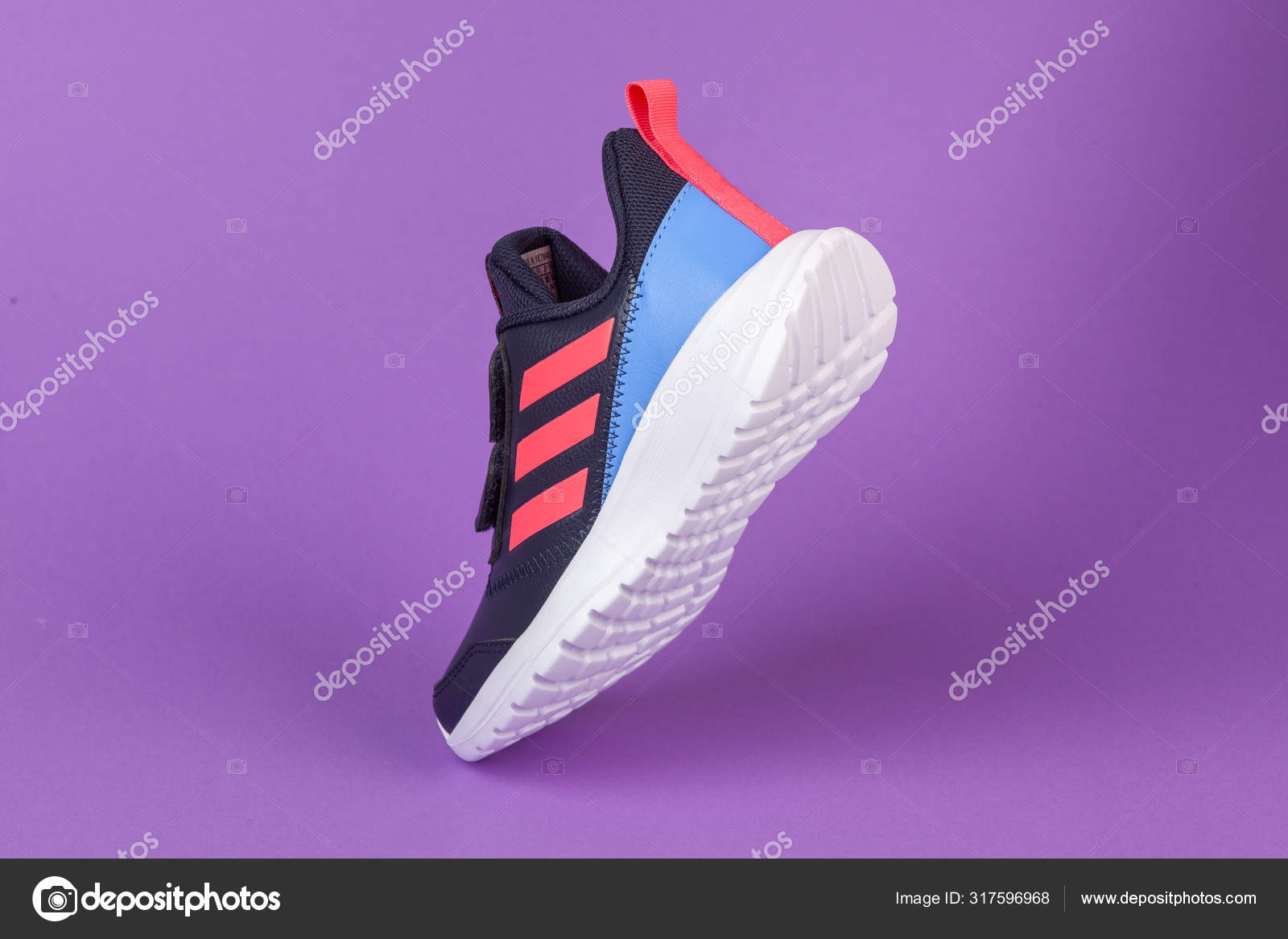 Varna , - AUGUST 13, 2019 : ADIDAS ALTA RUN sport purple background. Product shot. Adidas