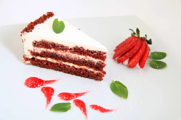 Slice of fresh strawberry cake with a decoration — Stock Photo, Image