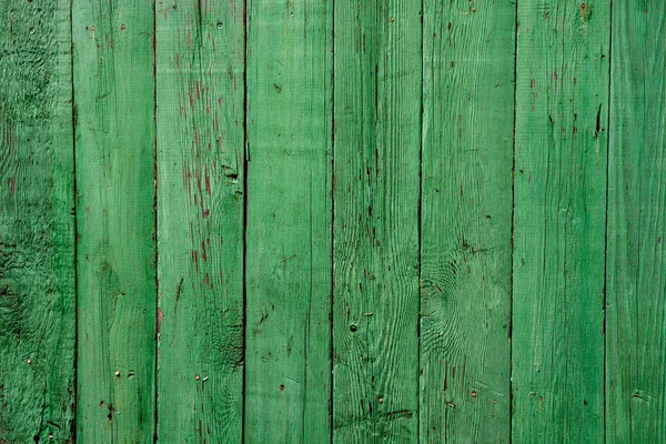 Старая доска окрашена в зеленый цвет — стоковое фото