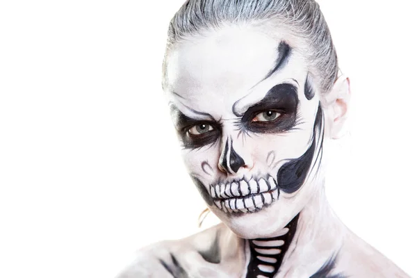 Flicka med kreativa halloween ansikte konst på vit bakgrund. — Stockfoto