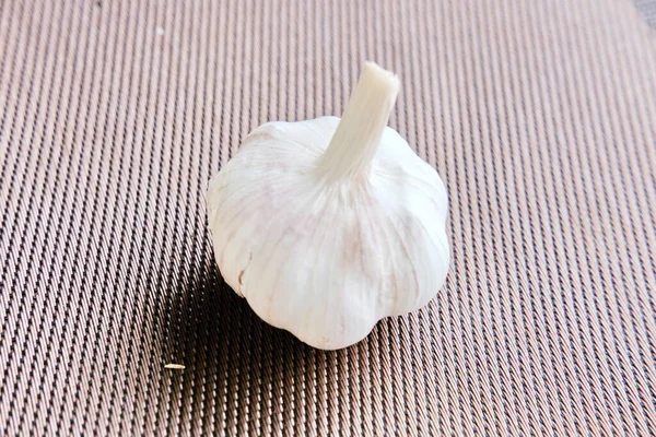 useful for colds and diseases fresh fragrant garlic is on the table