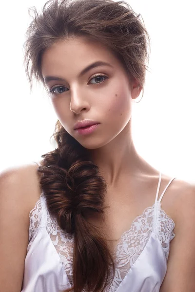 Beautiful girl in image of bride with plait. Model with nude makeup and silk underwear. Beauty face. — Stock Photo, Image