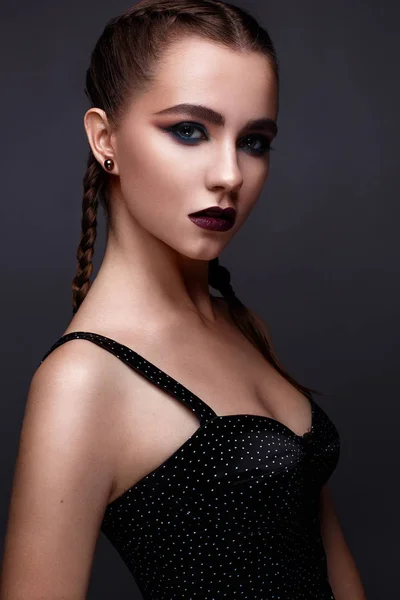 Beautiful woman with bright creative make-up. Model with braids and lip color marsala. Beauty face. — Stock Photo, Image