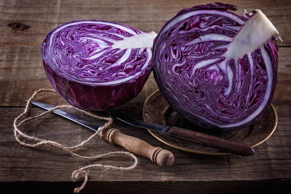 Purple cabbage over rustic wooden background — Stock Photo, Image