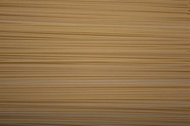 Arkaplanı yapıştır. Arka plan yerine makarna. Reklamcılık. Yemek pişirme kavramı. Koronavirüs salgını sırasında uzun vadeli bir depolama ürünü. Uzayı kopyala Yatay oryantasyon. Bağış