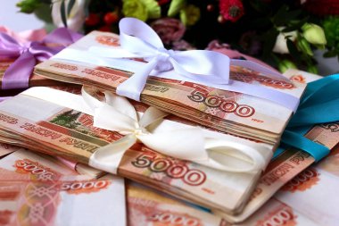 five thousand rubles a pack of money as a gift clipart