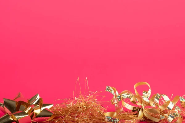 Gold ribbon on pink background. Valentine's Day concept. — Stock Photo, Image