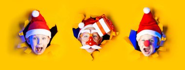 Şapkalı küçük neşeli Noel Baba 'nın birkaç portresi neon ışıklarıyla aydınlatılan dağınık sarı arka plandan kurtuluyor. Hepsinin büyük boyutu