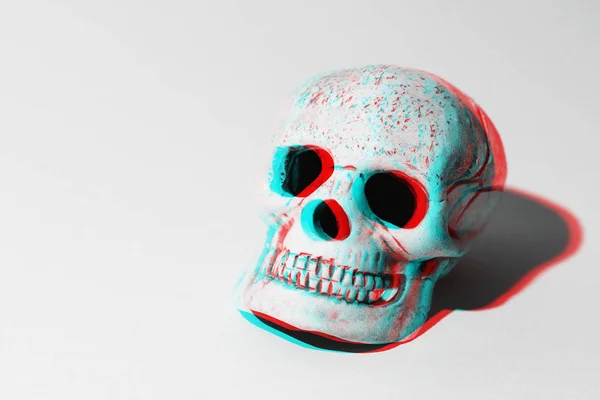 3D Totenkopf auf grauem Hintergrund Stockbild