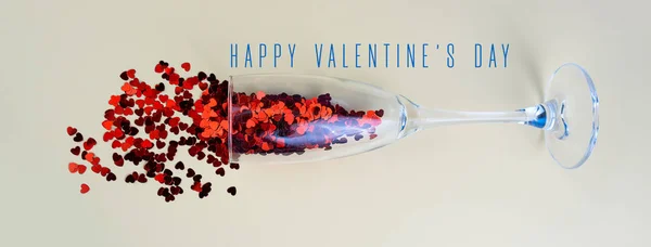 Red hearts in a glass. Valentine's Day concept. — Stock Photo, Image