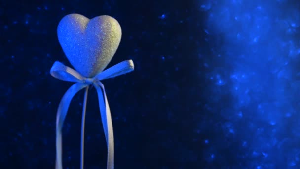 Romantic Heart Sequins Blue Bokeh Background Bows Fluttering Wind — Stockvideo