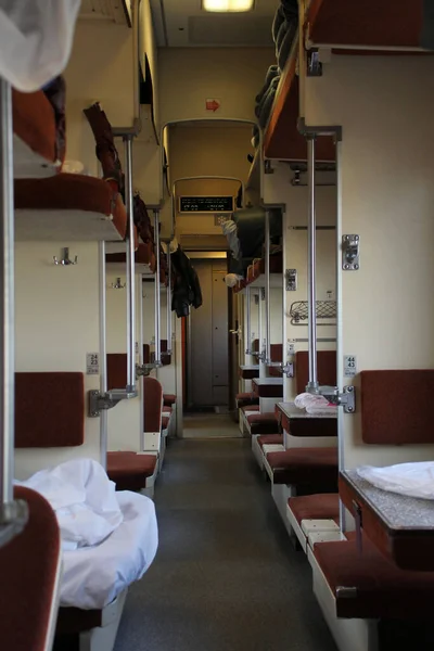 interior of a reserved seat train car without people