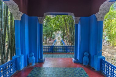 Marrakech, Morocco - April 2019: Beautiful view of Majorelle Garden featuring a Cubist villa designed by Paul Sinoir and purchased by the fashion designers, Yves Saint-Laurent and Pierre Berg