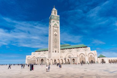 Casablanca, Morocco - April 2019: Exterior of Hassan II Mosque designed by Michel Pinseau, the largest mosque in Africa, and the 5th largest in the world. Its minaret is the world's tallest minaret