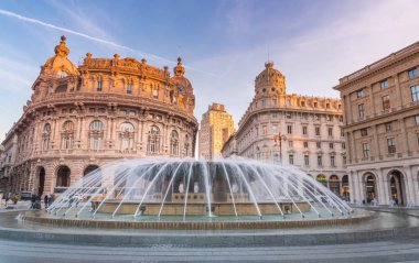Genova, Genoa, Italy - February 2019: Piazza De Ferrari is the main square of Genoa, renowned for its fountain and where many institutions were established: stock exchange (Borsa), Credito Italiano