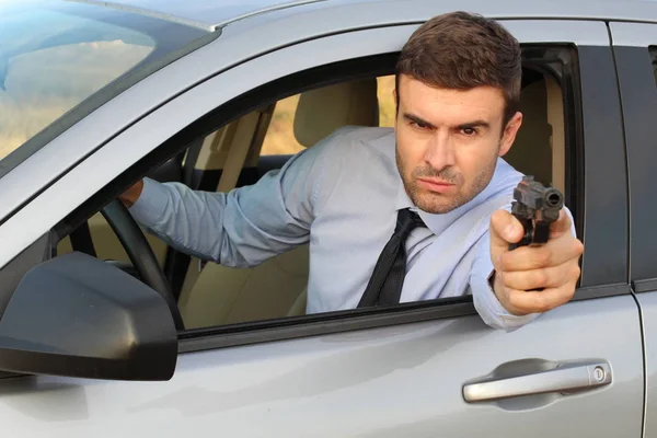 Profesional Asesino Conduciendo Coche Apuntando Con Arma —  Fotos de Stock