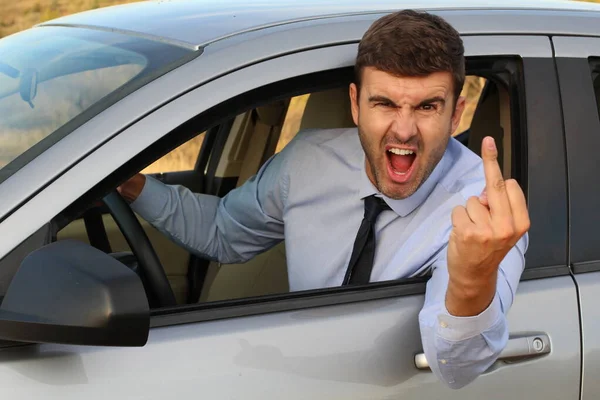 Enojado Hombre Negocios Conduciendo Coche Mostrando Mierda Fuera Signo —  Fotos de Stock