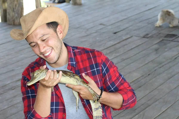 Indigenous Man Holding Caiman — 스톡 사진